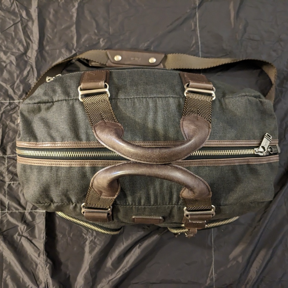 Tumi travel duffle bag & sling set.
